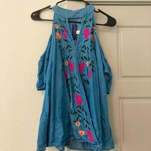 Francesca’s blue rain open shoulder top